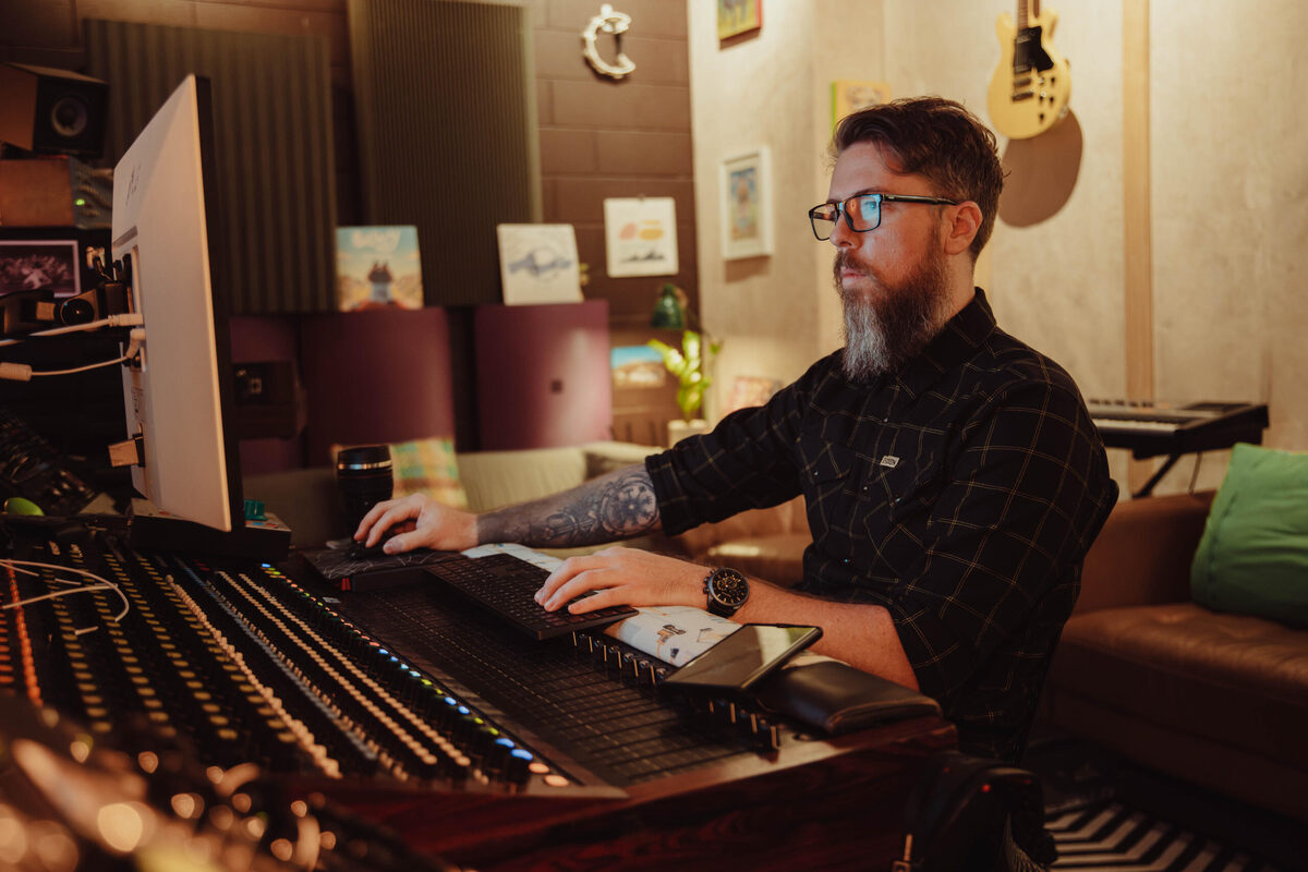 Andrew Nolan, producer and engineer, at the mixing console at Animus Studios